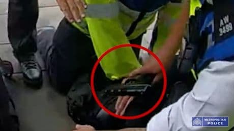Moment police tackle cosplaying boy, 16, carrying toy gun after Premier League match