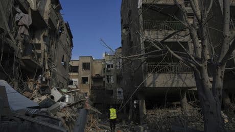 Israel says it killed 9 Iranian nuclear scientists, and braces for attacks from Iran