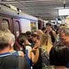 The great Amalfi Coast divide: Videos show tourists crammed onto buses and inching down streets in Italian holiday hotspot... while the rich and famous dodge crowds on superyachts