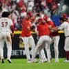 Lux's walkoff single in 2-run 11th gives Reds 5-4 win over Yankees