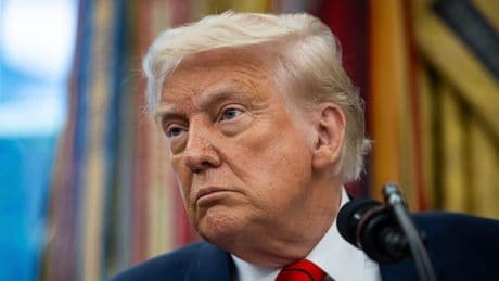 Federal Reserve warns of impact of Trump tariffs as US interest rates held