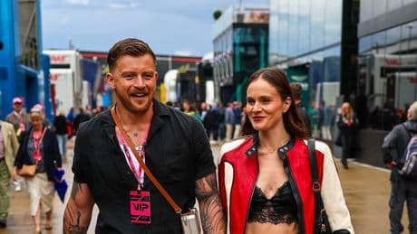 Maura Higgins braves the heat in all leather as she leads stars at Grand Prix