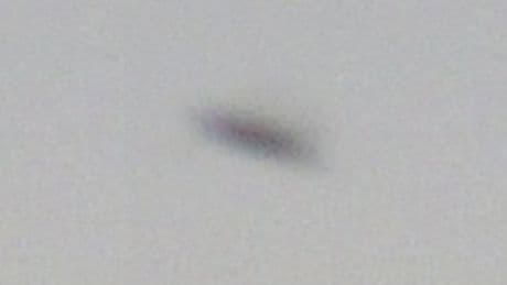 Yorkshire resident spots saucer-shaped 'UFO' flying though the hills near Skipton - and experts are baffled