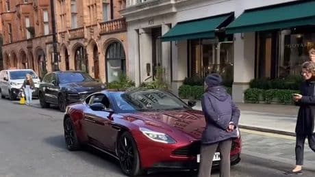 Moment furious OAP stops ‘noisy’ £180k Aston Martin in middle of the street – but who’s in the wrong?