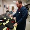 Fire departments concerned about cancer risks are buying gear that is free of forever chemicals