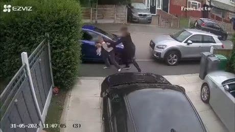 Horror moment dad carrying 3-month old baby girl is randomly attacked in street by yob who swings punches at his head