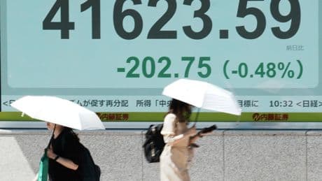 Asian shares retreat after Alphabet and AI stocks nudge Wall Street to more records