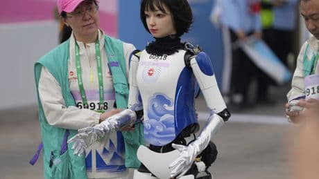Humanoid robots join runners for half-marathon — but some of the droids struggled to find their footing