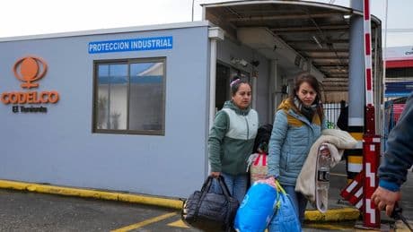 Rescue workers in Chile find the body of one of 5 miners trapped in a copper mine