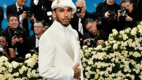 The Latest: The Met Gala opens as rain fails to dim the stars for fashion's biggest night