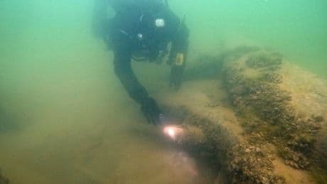 Angler fishing in Lake Michigan fog discovers remains of abandoned tugboat J.C. Ames
