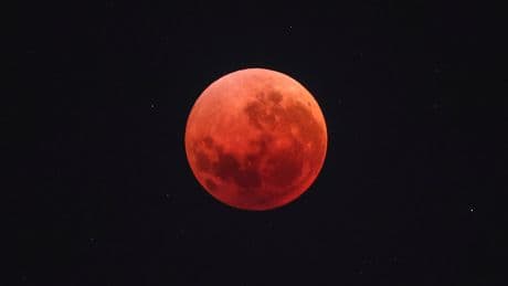 Crowds gather to watch ‘blood moon’ total lunar eclipse