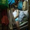 Inside Hong Kong's terrifying 'coffin homes' with 200,000 crammed into cage-like spaces