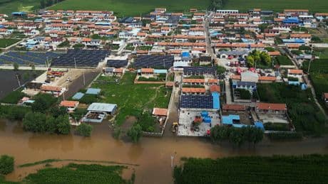 Beijing officials say 31 older people trapped in a senior center died in floods