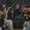 Pirates hit 2 homers off Holmes and blank Mets 4-0 to prevent 3-game sweep