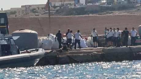 A boat carrying migrants capsizes off Italy, killing at least 26