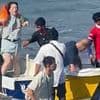 Bali tourist boat capsizes killing two - as five Australians narrowly make it out alive in dramatic rescue