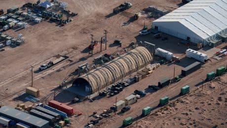Largest ICE detention facility at Fort Bliss opens after months of delays, contract squabbles, and a workplace death
