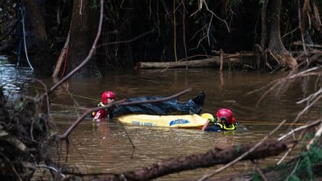Photos of search crews racing against time as Texas flood deaths near 90