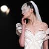 Iris Van Herpen unveils 'living' couture dress of bioluminescent algae in Paris