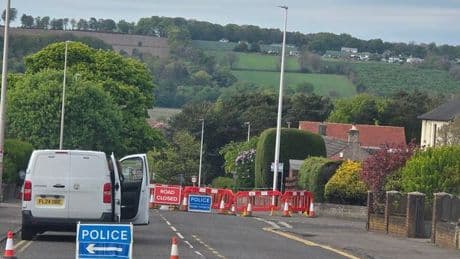 Man rushed to hospital with 'serious injuries' after being bit by BMW in Dundee