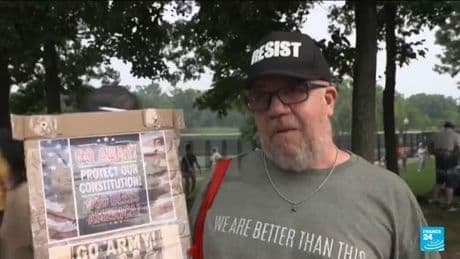 Donald Trump flexes military might at parade as protests sweep US