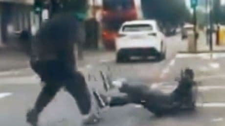 Moment horror street brawl breaks out before driver runs over cyclist