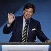 Tucker Carlson warns that Fox News 'liars' influencing Trump could END his presidency over nuclear war