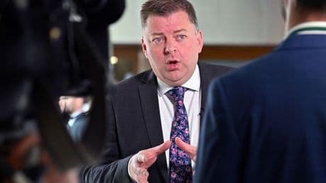 Labour politician suspended after being charged by police over indecent images