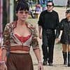 Smiling Lily Allen puts on a leggy display as she steps out with stylist Marco Capaldo in two chic outfits for second day of Glastonbury - weeks after date with actor James Norton