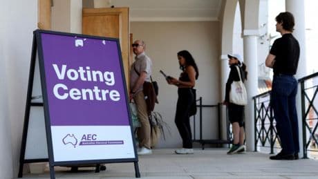 Australians vote in election shaped by inflation and climate anxiety