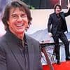 Tom Cruise cuts a dapper figure in all black as he leads the arrivals at Mission: Impossible's star-studded London premiere