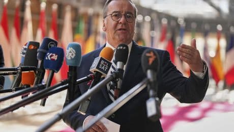 German defense minister: draft could return if volunteer numbers fall short