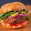 Lewis Hamilton-backed synthetic meat burger chain shuts last UK restaurants as losses mount