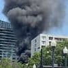 Car explodes in Washington DC as black smoke billows through sky