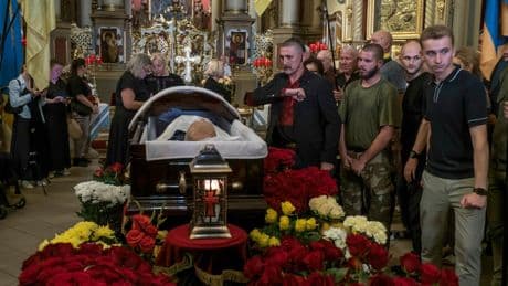 Hundreds mourn pro-Western Ukrainian politician who was gunned down in the street