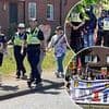 Fury erupts over footage of second police force escorting pro-migrant protesters to asylum seeker hotel as Epping unrest sparks nationwide tensions