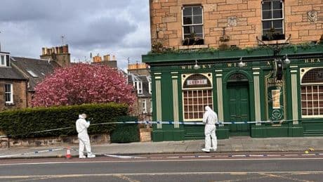 Man charged after 'stabbing' in Edinburgh as forensic officers comb street