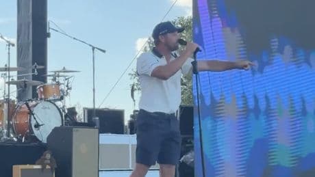 Watch Bryson DeChambeau whip up LIV golf crowd in Dallas as he grabs mic in stage invasion
