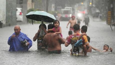 Photos of Storm Wipha as it hits Asia