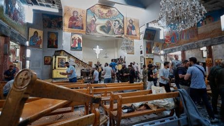 Suicide bomber kills at least 13 in packed Syrian church near Damascus
