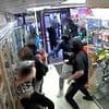 Terrifying moment feral gang of balaclava-clad teens attack shop worker then steal vapes and fizzy drinks