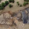 Water tanks replace springs on a Serbian mountain as drought endangers some 1,000 cows and horses