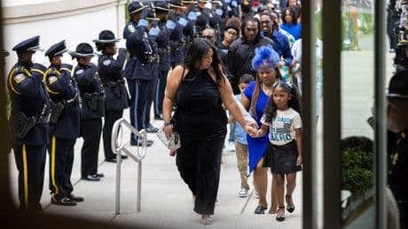 Law enforcement officers remember police officer who died after CDC shooting