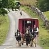 Thousands of travellers descend on Appleby Horse Fair with gypsy wagons, trailer trucks and caravans sparking traffic chaos and clogging up roads