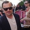 Leonardo DiCaprio, 50, cuts a dapper figure as he attends day two of Cannes Film Festival with glamorous girlfriend Vittoria Ceretti, 26