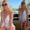 Claudia Schiffer proves she has hardly aged a day since 90s supermodel era as she flaunts her jaw-dropping figure in plunging swimsuit for 55th birthday