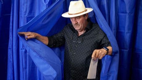 Romanians cast votes in presidential rerun after voided election sparked deep political crisis