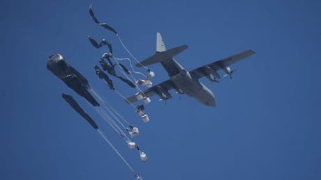 The Latest: Israeli strikes kill 34 in Gaza after Israel eases some aid restrictions