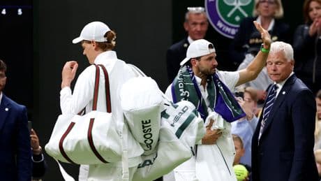 Jannik Sinner carries Grigor Dimitrov’s bags off court after heartbreaking retirement